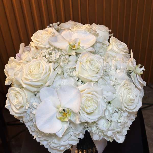 White rose and orchid bouquet with hydrangeas