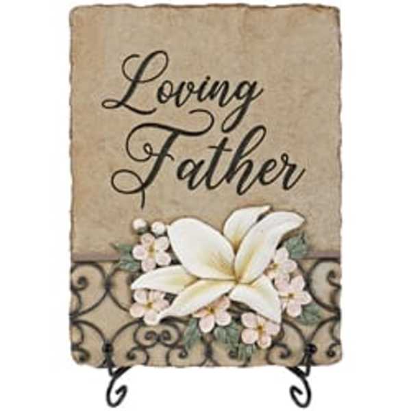 Decorative plaque reading "Loving Father" with white flowers