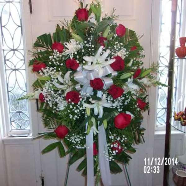 Standing floral spray with red roses and white lilies