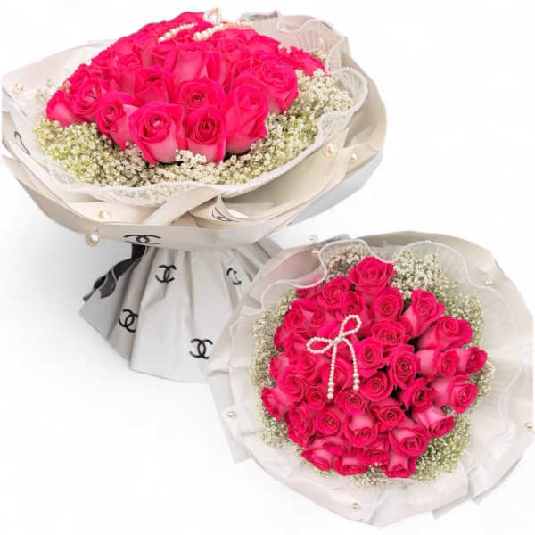 Hot pink rose with baby’s breath