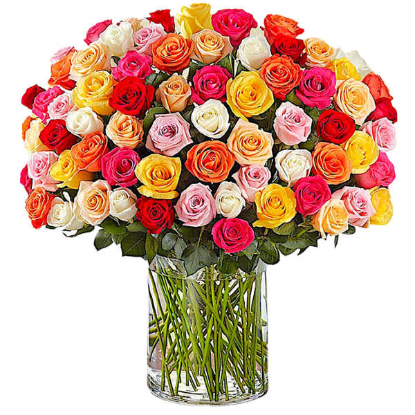 Large bouquet of multicolored roses in a clear glass vase