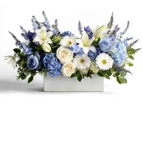Blue and white floral arrangement in a white rectangular box