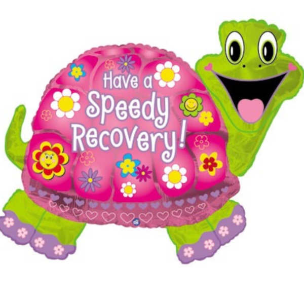 Pink turtle-shaped recovery balloon with floral decorations