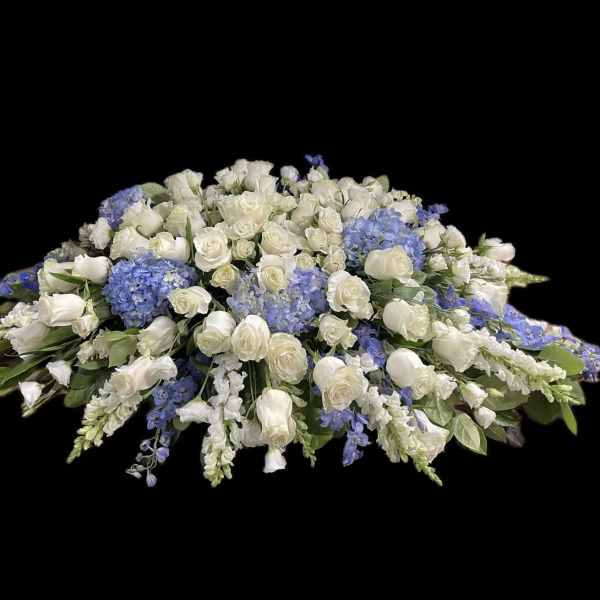 Large white and blue floral casket spray