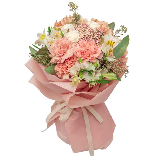 Pink and white bouquet wrapped in blush paper with a ribbon