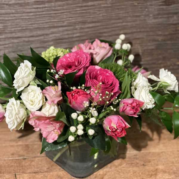 Pink and white mixed bouquet in a glass vase