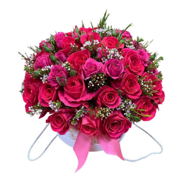 Round bouquet of hot pink roses in a hatbox with ribbon handles