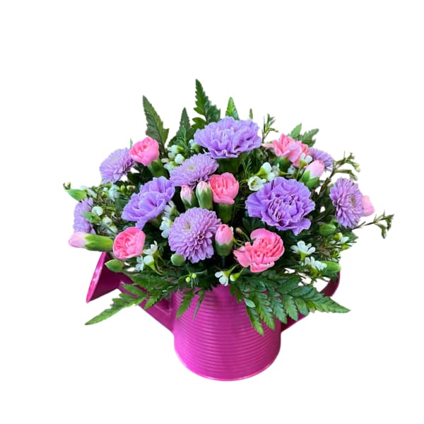 Pink and lavender mixed bouquet in a magenta container