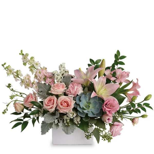 Pink lilies and roses in a white rectangular vase