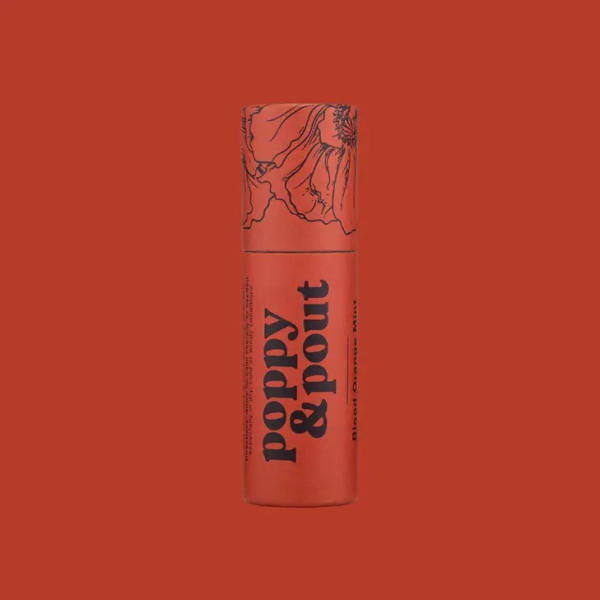 A coral lipstick tube with floral line art and bold text