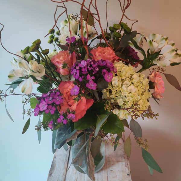 Mixed bouquet with pink roses, white alstroemeria, and purple dianthus