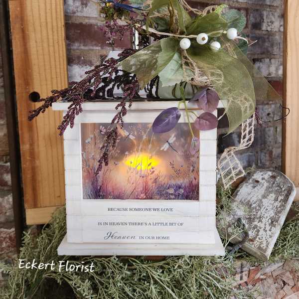 Decorative memorial lantern with faux greenery and berries
