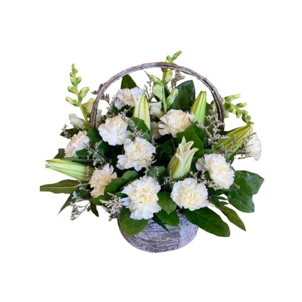 White carnations and lilies in a handled basket
