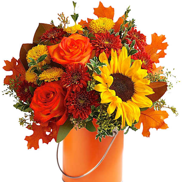 Orange and red bouquet with sunflowers and roses in an orange bucket