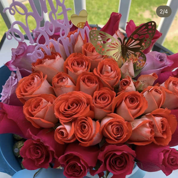 Orange,pink,and purple roses by lav.ishbouquets