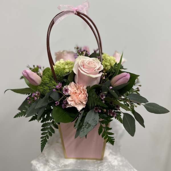 Blush Lady's purse by Westford Florist Art by Veny