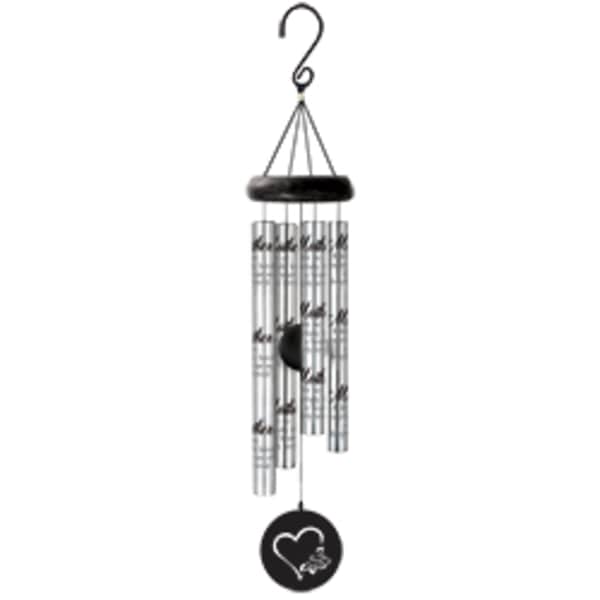 Hanging metal wind chime with silver tubes and a black heart medallion
