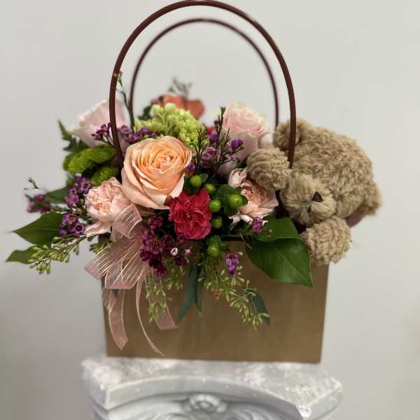 Flower gift bag with plush bear by Westford Florist Art by Veny