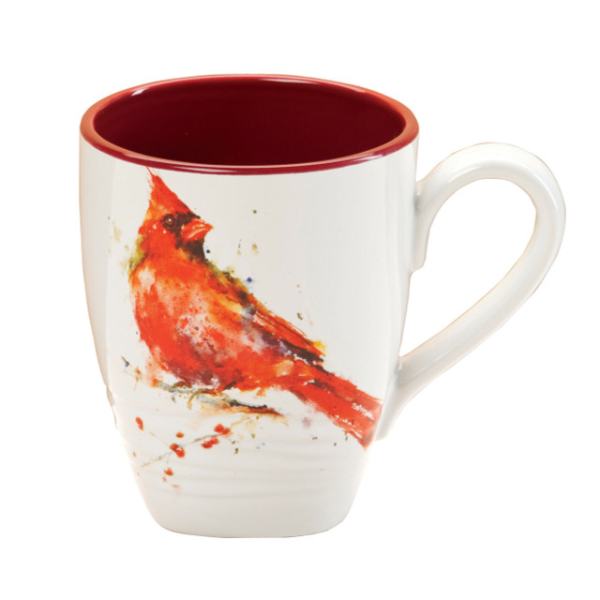 White ceramic mug with a red cardinal illustration and red interior