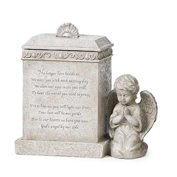 Stone memorial plaque with a praying angel figurine