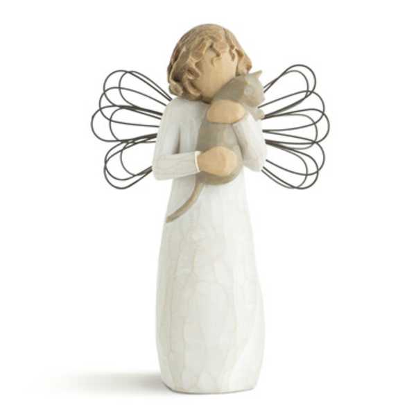Angel figurine holding a small bird