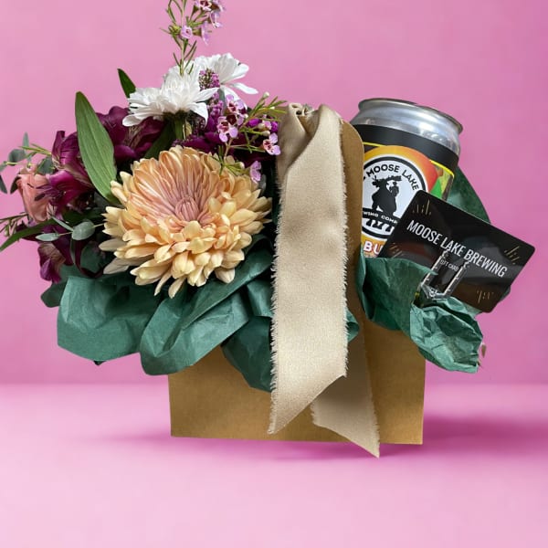 Flower gift basket with a beer can and gift card