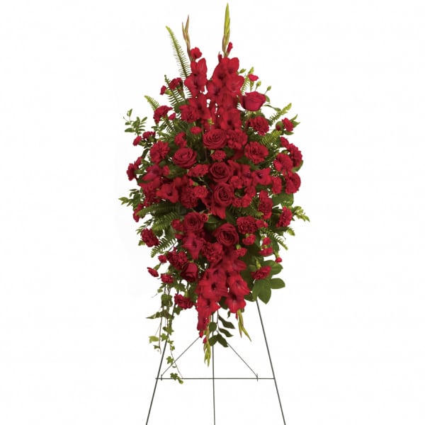 Tall red floral spray on a metal easel
