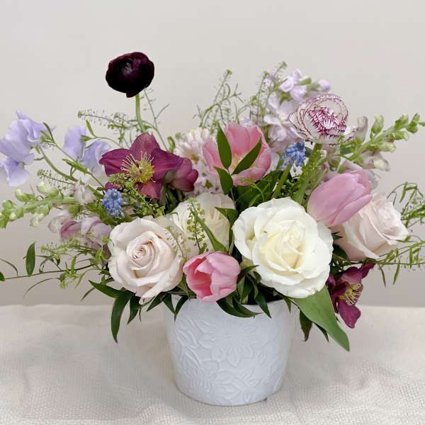 Mixed pastel bouquet in a white embossed vase