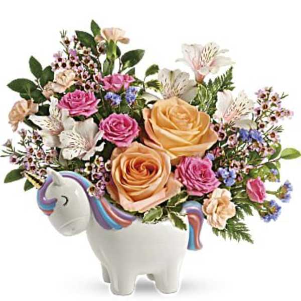 Colorful bouquet in a unicorn-shaped vase