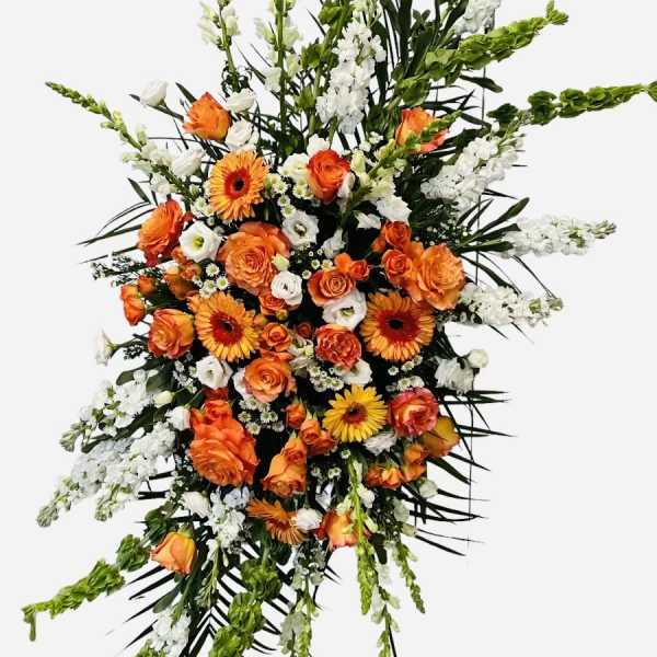 Large standing floral spray with orange and white flowers