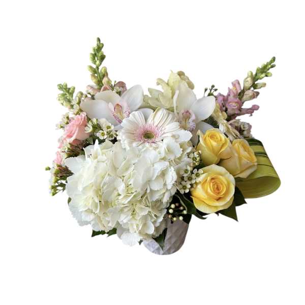Bouquet of white hydrangeas, yellow roses, and a white gerbera daisy