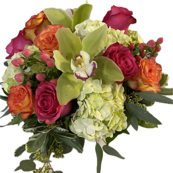Colorful arrangement of hot pink roses, orange roses, green hydrangeas, and a green orchid