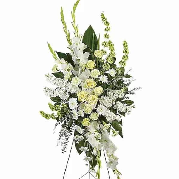 Tall white floral standing spray on an easel