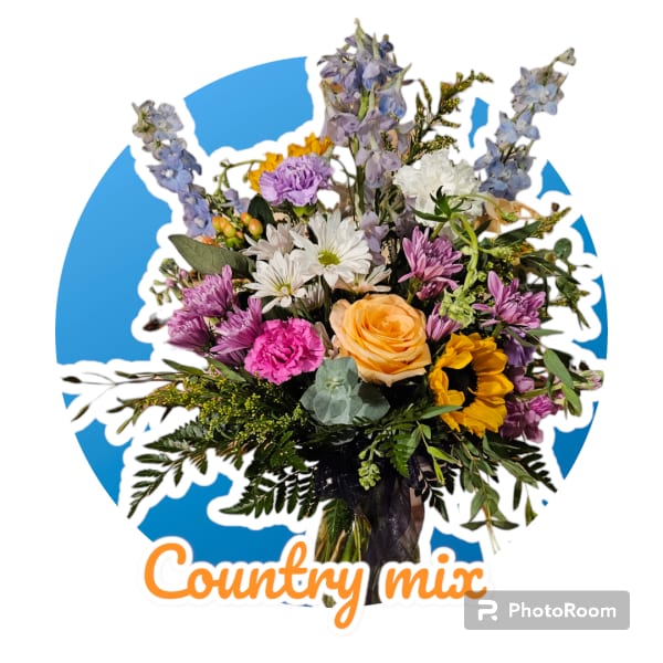 Mixed bouquet with a peach rose, sunflower, daisies, and purple blooms