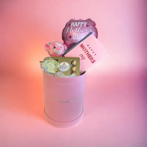 Mother's Day gift box with a teddy bear, chocolates, and cards