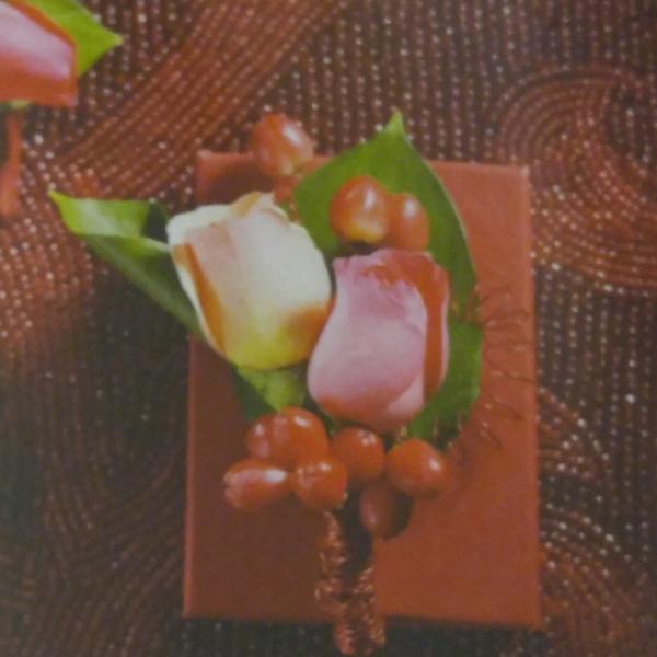 hug roses boutonniere