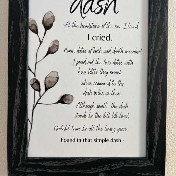 Framed memorial quote print with a simple floral branch illustration