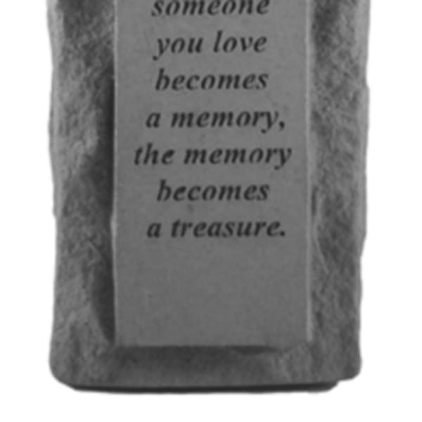 Gray memorial plaque with an engraved quote