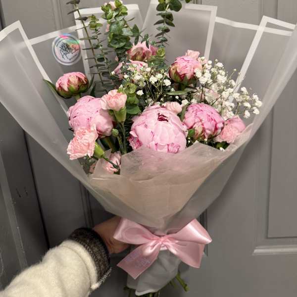 Pink peony bouquet with baby's breath and ribbon wrap