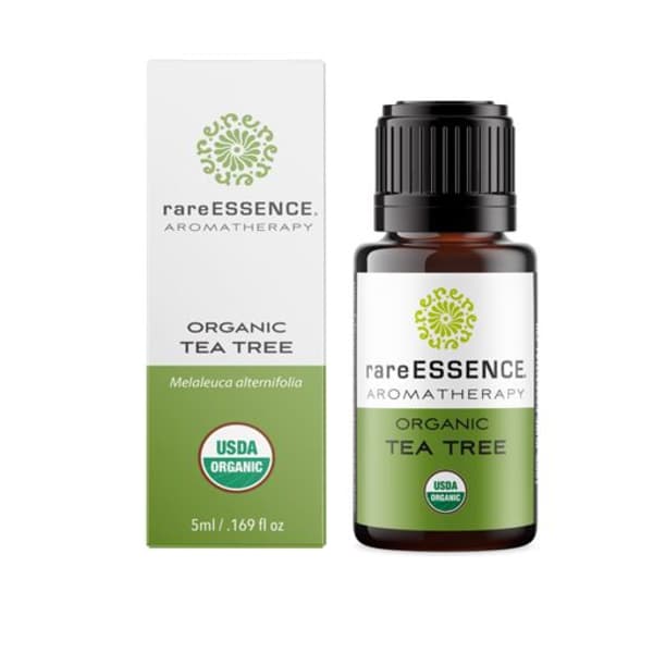 Tea tree essential oil bottle beside its box