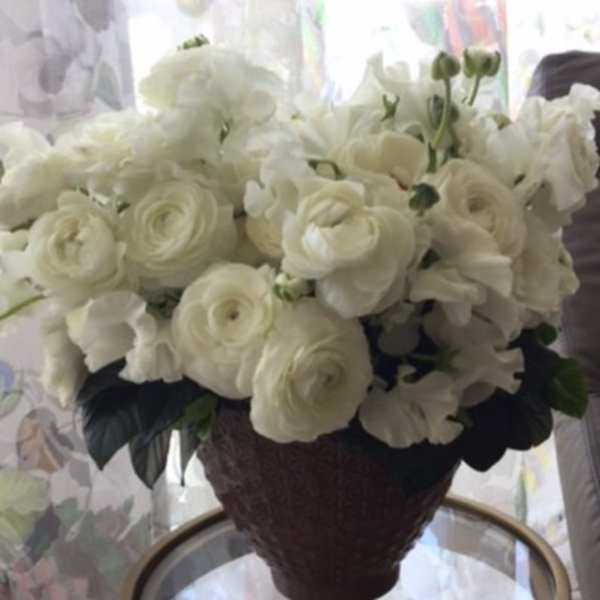 White flower bouquet in a dark vase