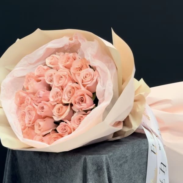 25 pink roses wrapped