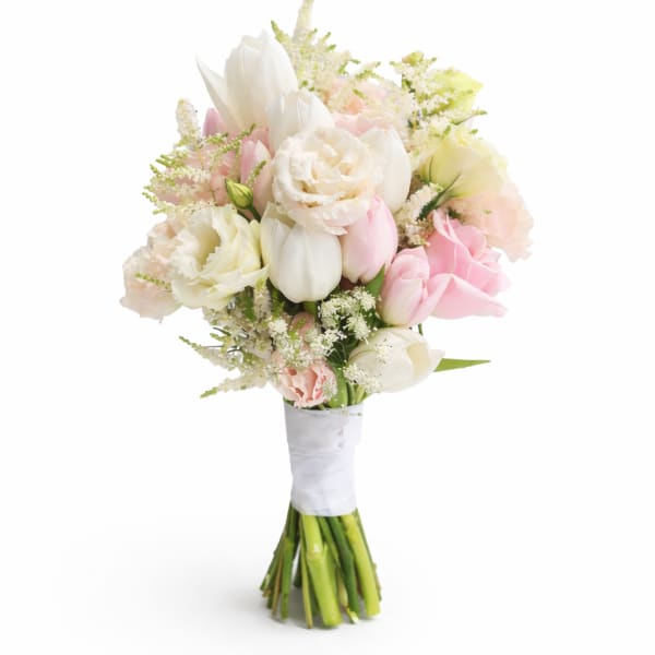 Bouquet of white and pink tulips with pale roses and filler flowers