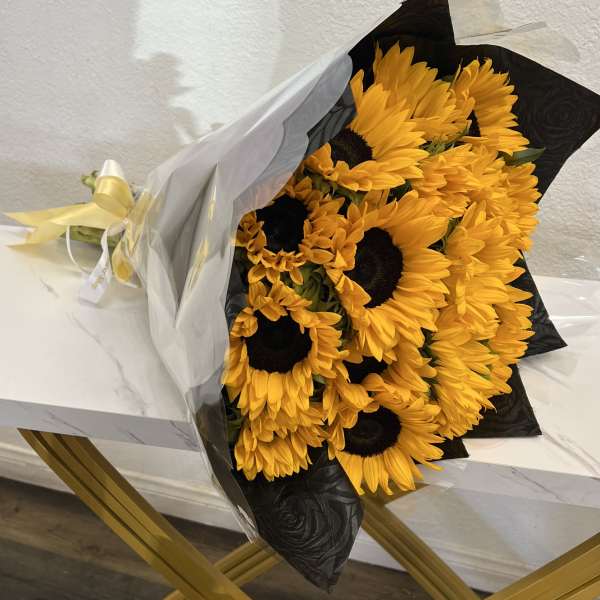12 Sunflowers Bouquet With Black Wrapping Paper