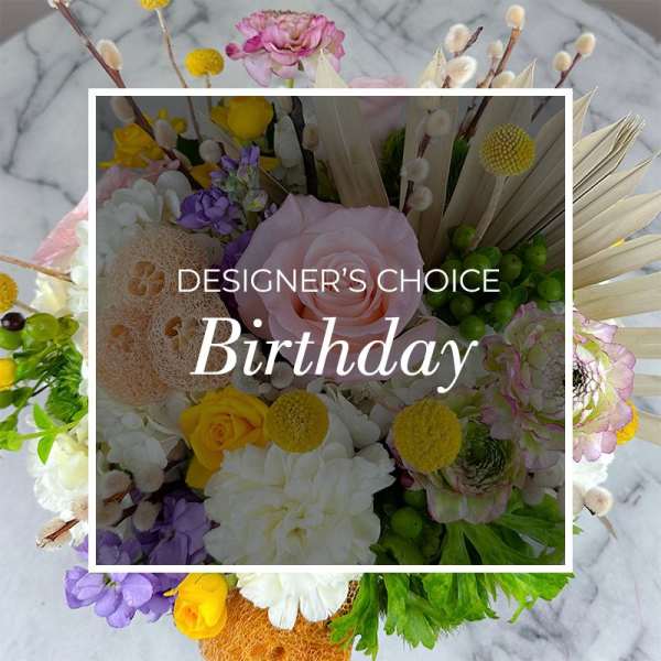 Mixed bouquet with pink rose, white chrysanthemum, and yellow blooms