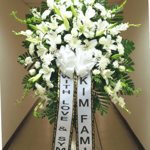 [TT-SPRAY33] GRAND SYMPATHY SPRAY IN WHITE WITH 2 PRINTED VERTICAL BANNERS BY TWIN TOWERS FLORIST, ARLINGTON VA