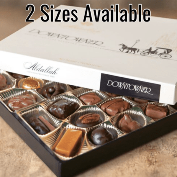 Box of assorted chocolates with a white lid and black base