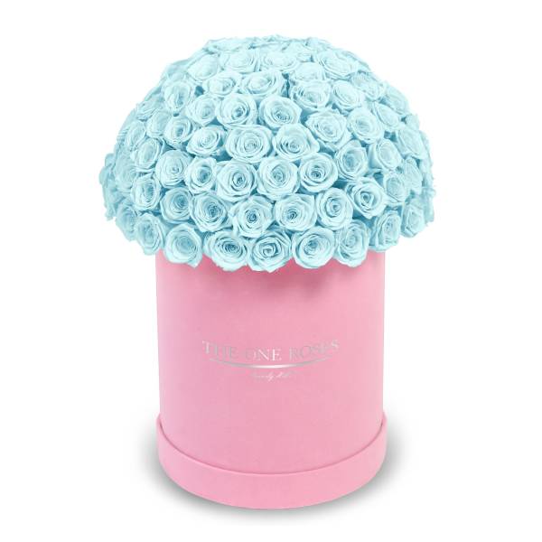 Blue rose bouquet in a pink round box