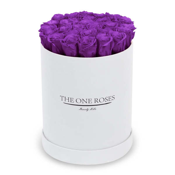 Purple roses arranged in a white round box