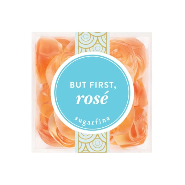 Box of orange rose-shaped candies labeled "But First, rosé"